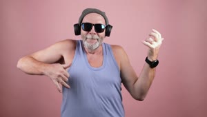 Stock Video Happy Old Man Playing An Imaginary Guitar Animated Wallpaper