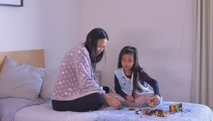 Stock Video Happy Mother And Daughter Playing At Home Animated Wallpaper