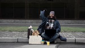 Stock Video Happy Homeless With Laptop Celebrating Animated Wallpaper