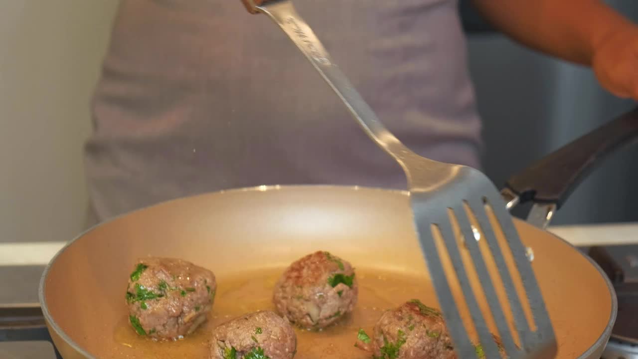 Download Stock Video Happy Couple While Cooking Animated Wallpaper