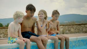Stock Video Happy Children Talking Sitting On The Edge Of The Pool Animated Wallpaper