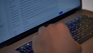 Stock Video Hands Typing On A Macbook Pro Animated Wallpaper