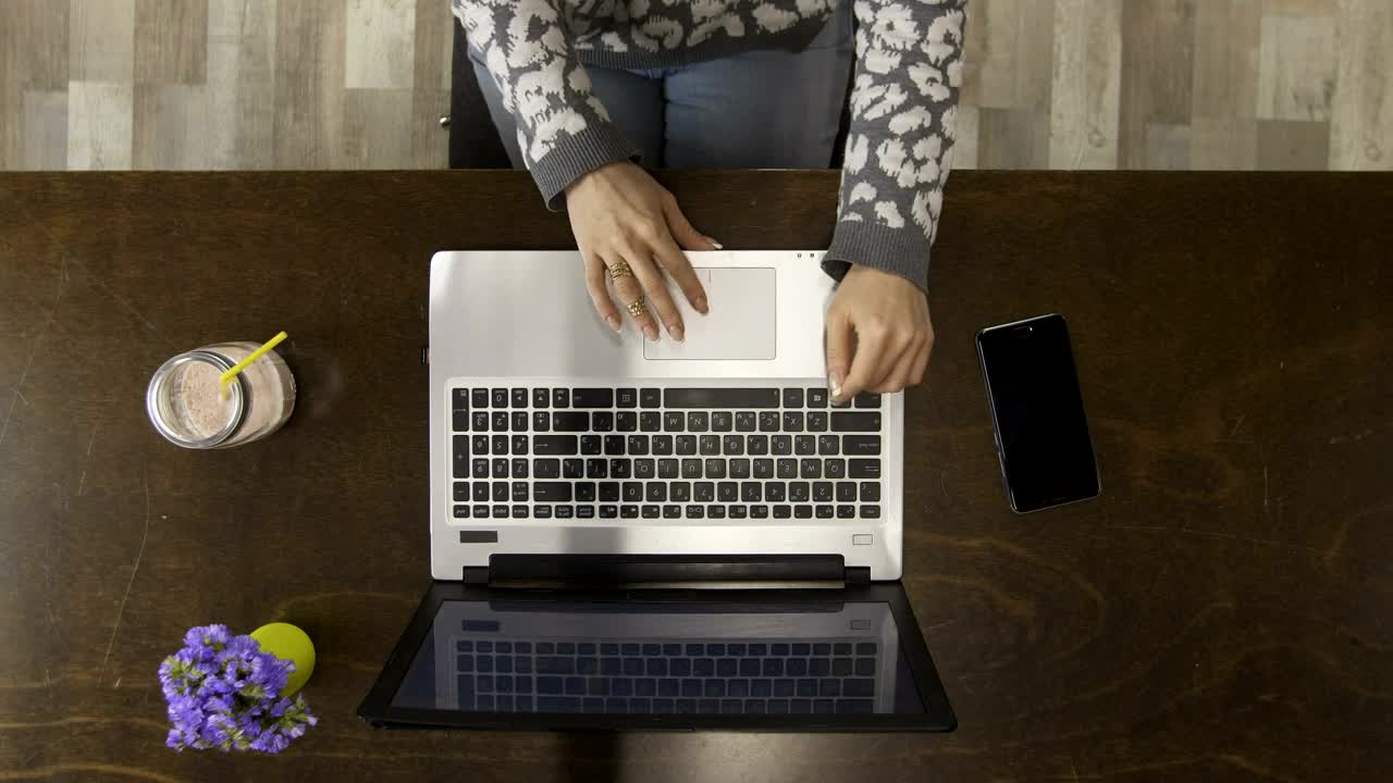 Download Stock Video Hands Typing On A Laptop Top Shot Animated Wallpaper