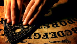 Stock Video Hands Playing Ouija Board Animated Wallpaper