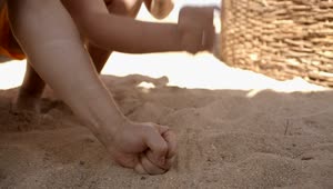 Stock Video Hands Playing In The Sand Animated Wallpaper