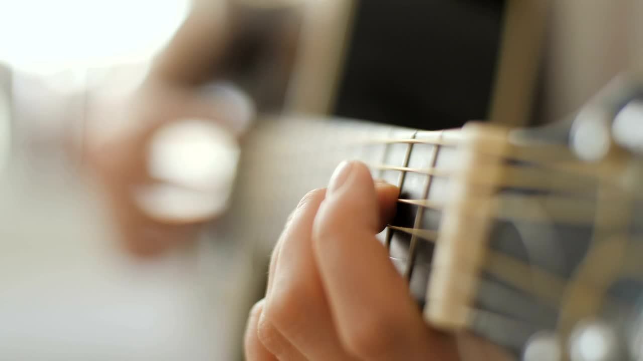 Download Stock Video Hands Playing An Acoustic Guitar Animated Wallpaper