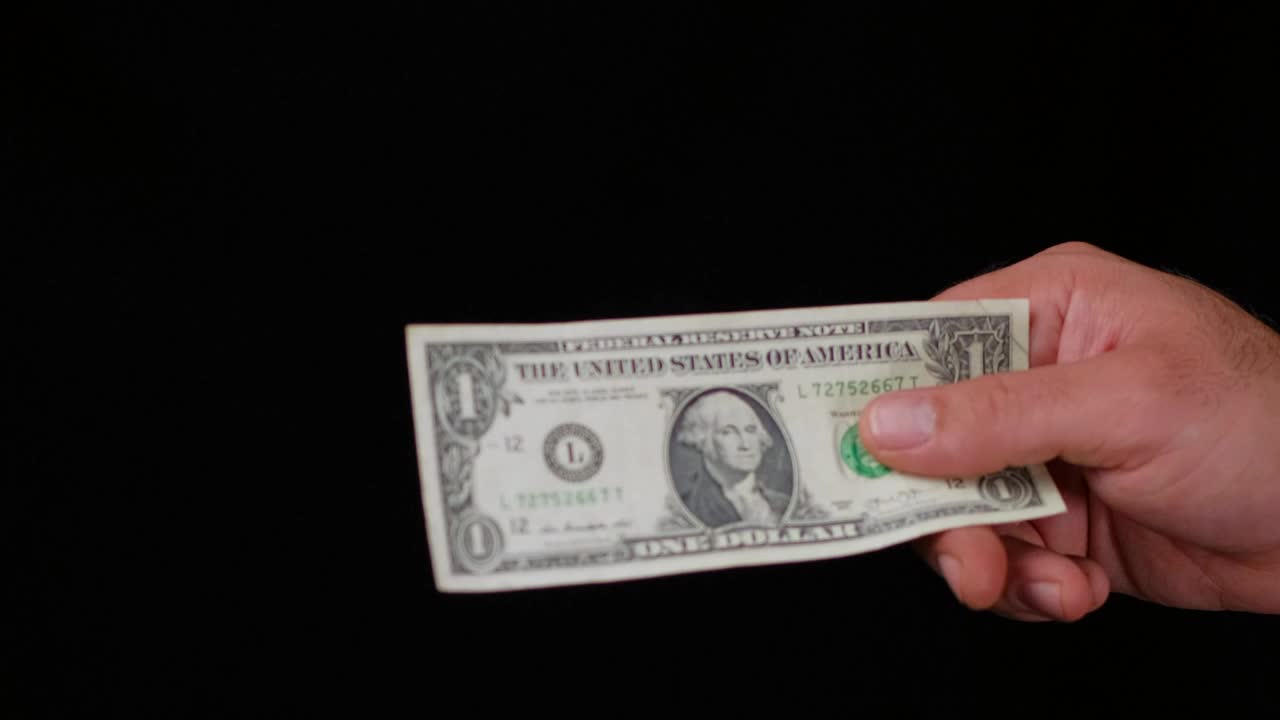 Download Stock Video Hands Of People During A Money Transaction Animated Wallpaper