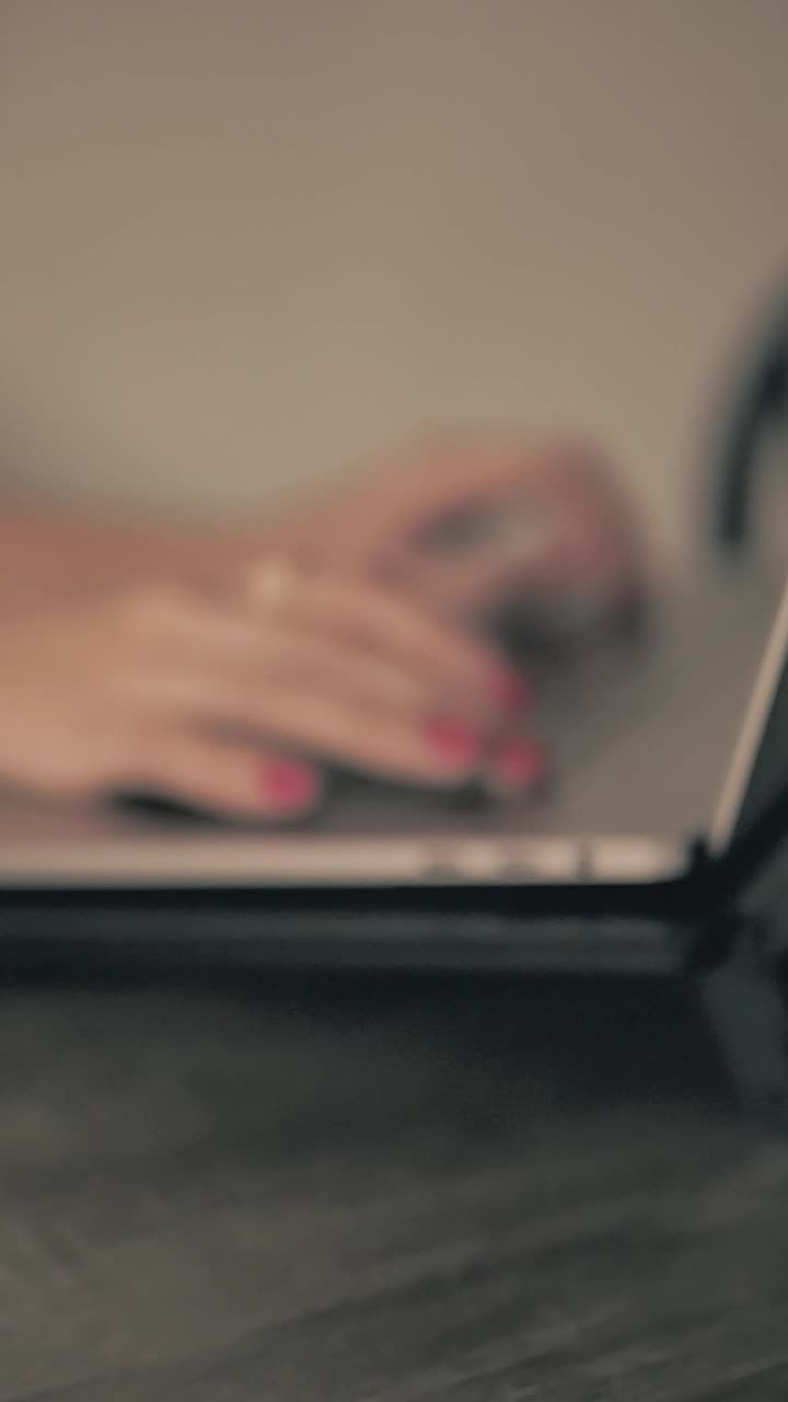 Download Stock Video Hands Of A Woman Typing On A Laptop Animated Wallpaper