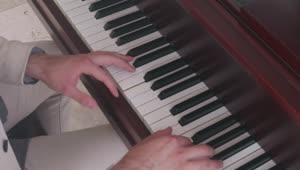 Stock Video Hands Of A Pianist Performing A Song On A Piano Animated Wallpaper