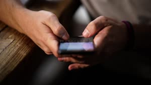 Stock Video Hands Of A Person Typing On A Cell Phone Animated Wallpaper