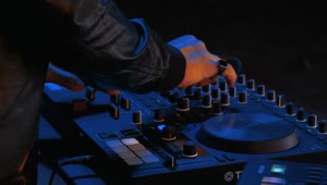 Stock Video Hands Of A Dj Turning Knobs On His Equipment Animated Wallpaper
