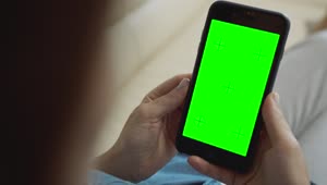 Stock Video Hands Hold Greenscreen Mobile Phone Animated Wallpaper