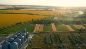 Stock Video Landscape Of Agricultural Fields And Industrial Building Animated Wallpaper
