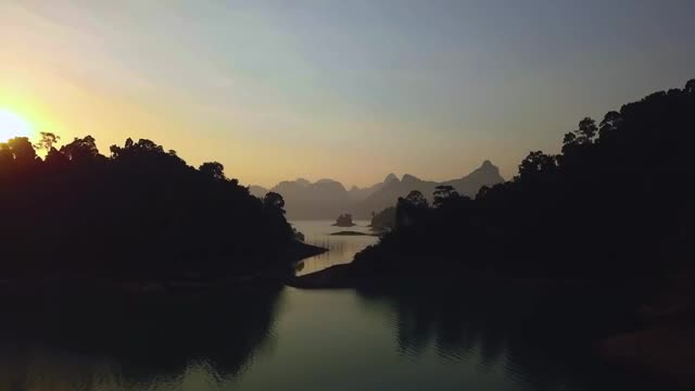 Download Stock Video Landscape Of A Large Lake During Sunset From The Air Smal Animated Wallpaper