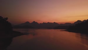 Stock Video Landscape Of A Lake During A Red Sunset Animated Wallpaper