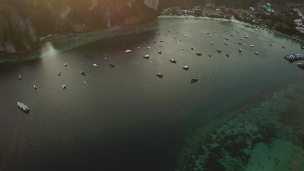 Download Stock Video Landscape Of A Bay During A Sunset Animated Wallpaper