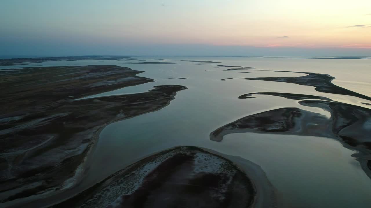 Download Stock Video Lake With Unusual Formations At Sunset Animated Wallpaper