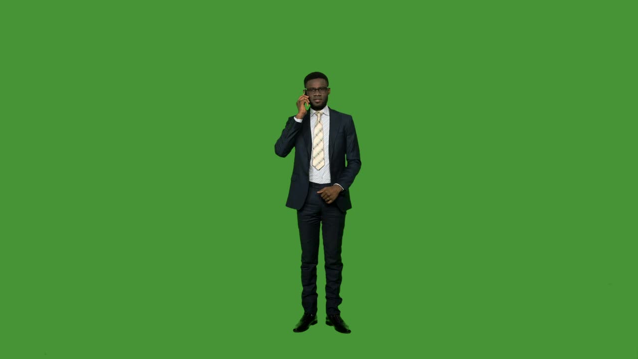Download Stock Video Man In A Suit On The Phone On A Green Animated Wallpaper