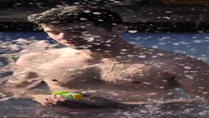 Stock Video Man Having Fun In A Swimming Pool Animated Wallpaper