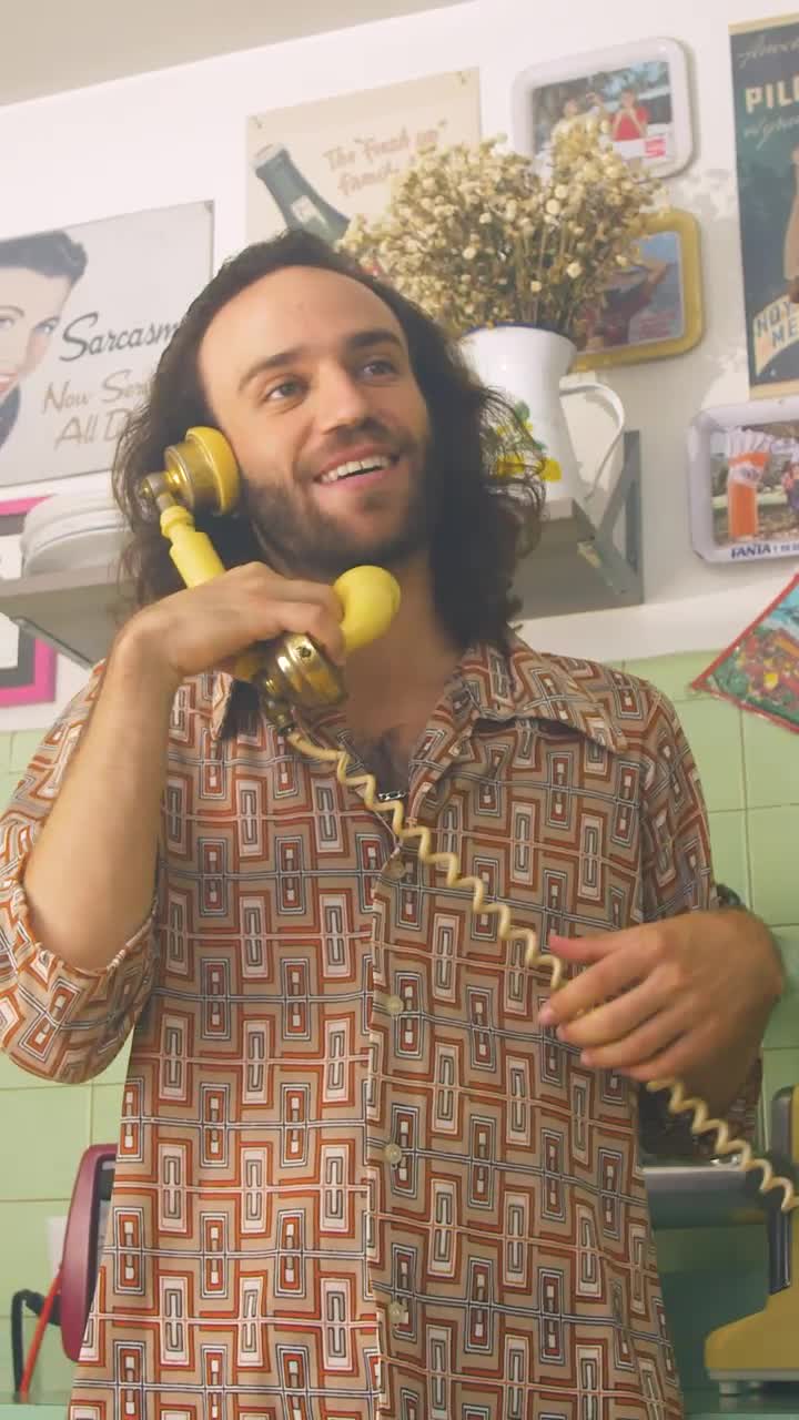 Download Stock Video Man Having A Phone Call At Home Animated Wallpaper