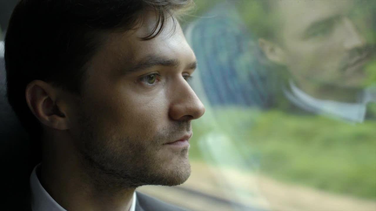 Download Stock Video Man Face By The Train Window Animated Wallpaper