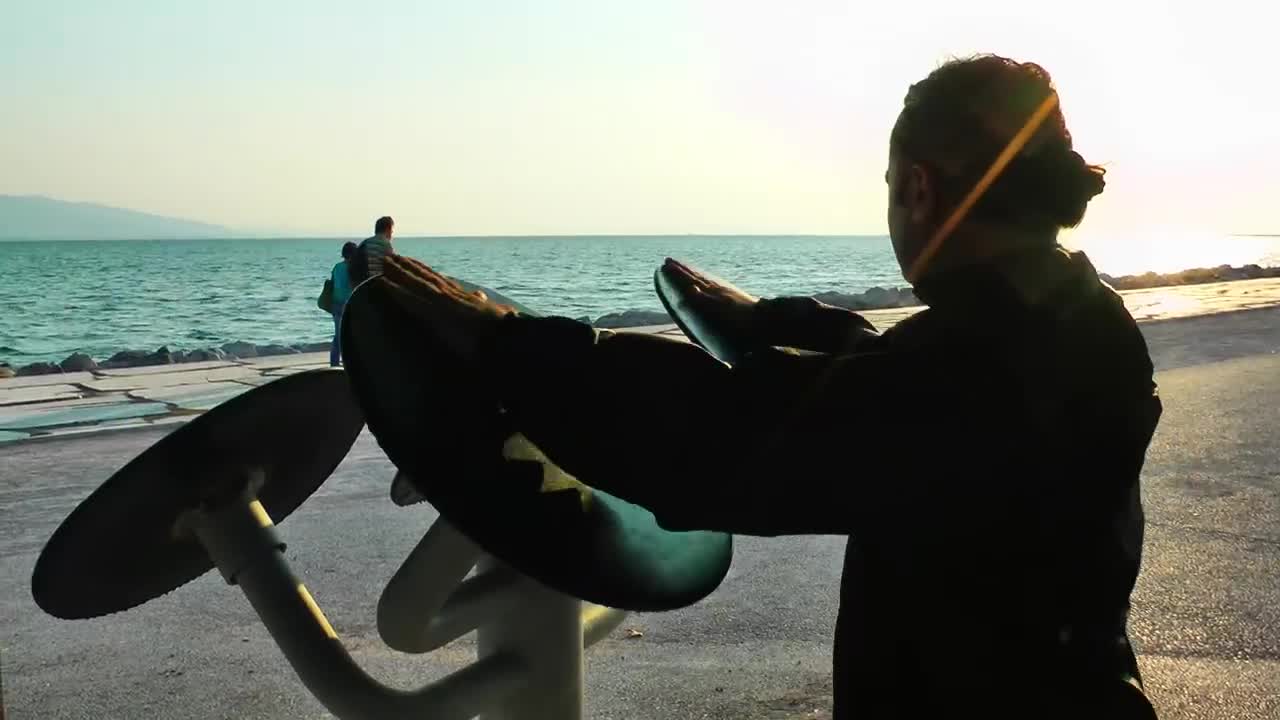 Download Stock Video Man Exercising In Front Of The Sea Animated Wallpaper