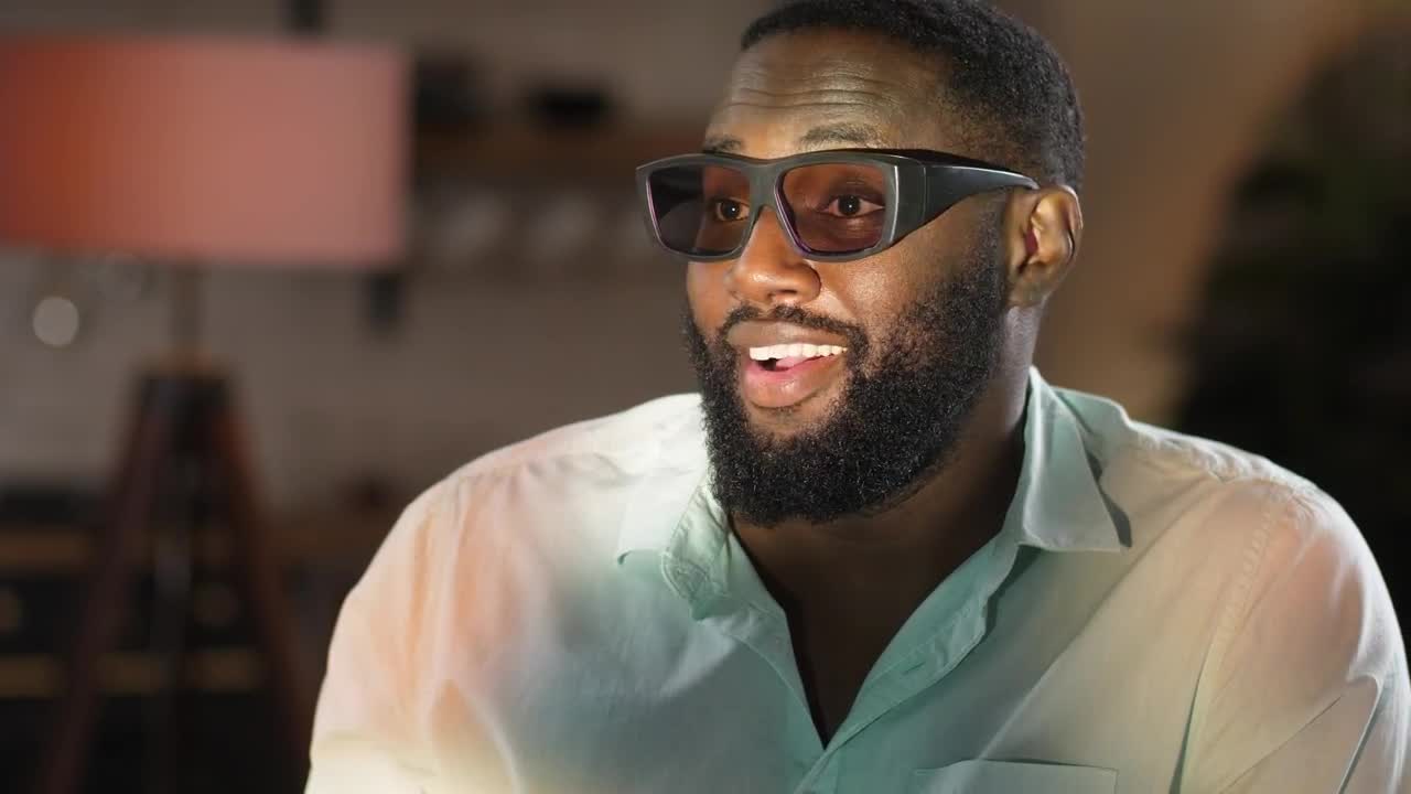 Download Stock Video Man Excited While Watching A D Film Animated Wallpaper