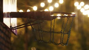 Stock Video Man Dunking The Ball In A Basketball Hoop At Night Animated Wallpaper