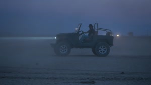 Stock Video Man Driving A Jeep In The Desert At Night Animated Wallpaper
