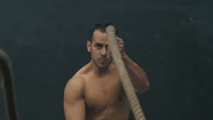 Stock Video Man Doing Rope Exercise Animated Wallpaper