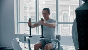 Stock Video Man Doing Chest Exercise At A White Gym Animated Wallpaper