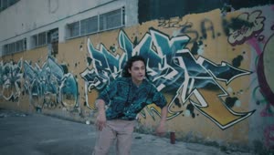 Stock Video Man Dancing On The Street Of A Neighborhood Animated Wallpaper