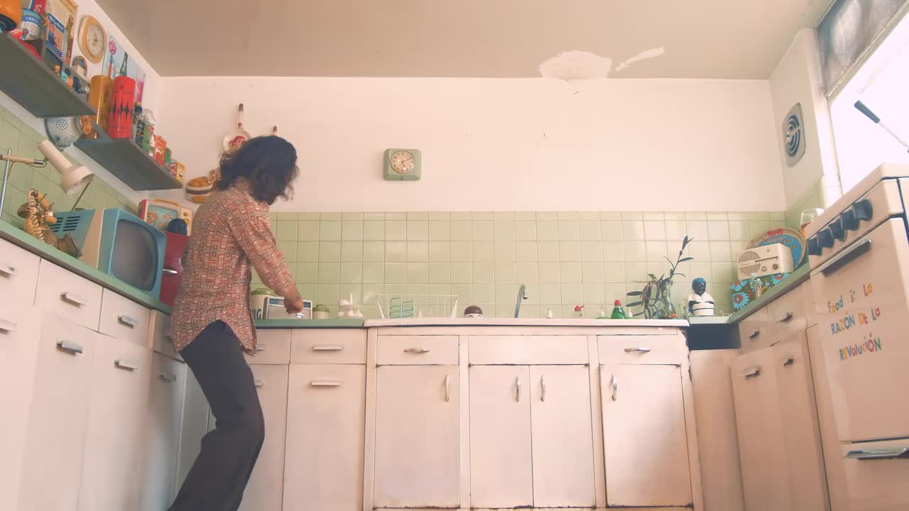 Download Stock Video Man Dancing In A Retro Kitchen Animated Wallpaper