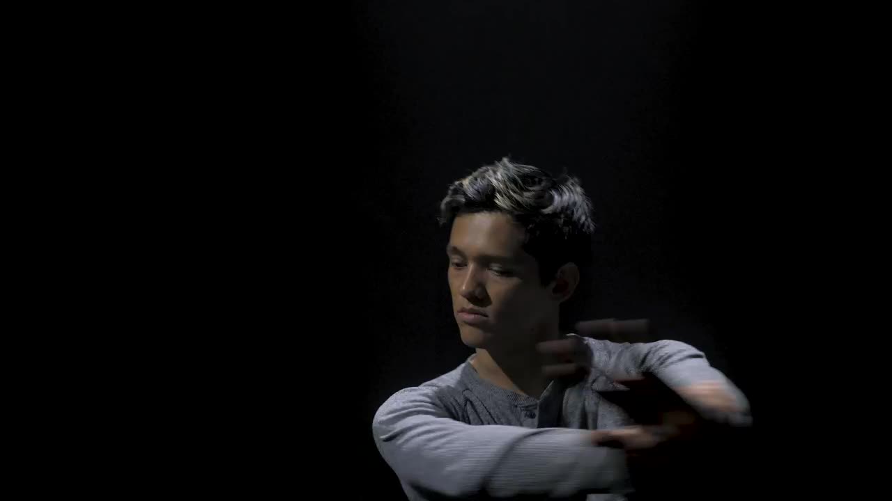 Download Stock Video Man Dancing Contemporary In The Dark Animated Wallpaper