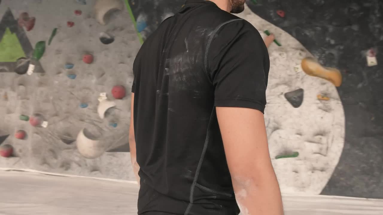 Download Stock Video Man Climbing A Mountaineering Training Wall Animated Wallpaper