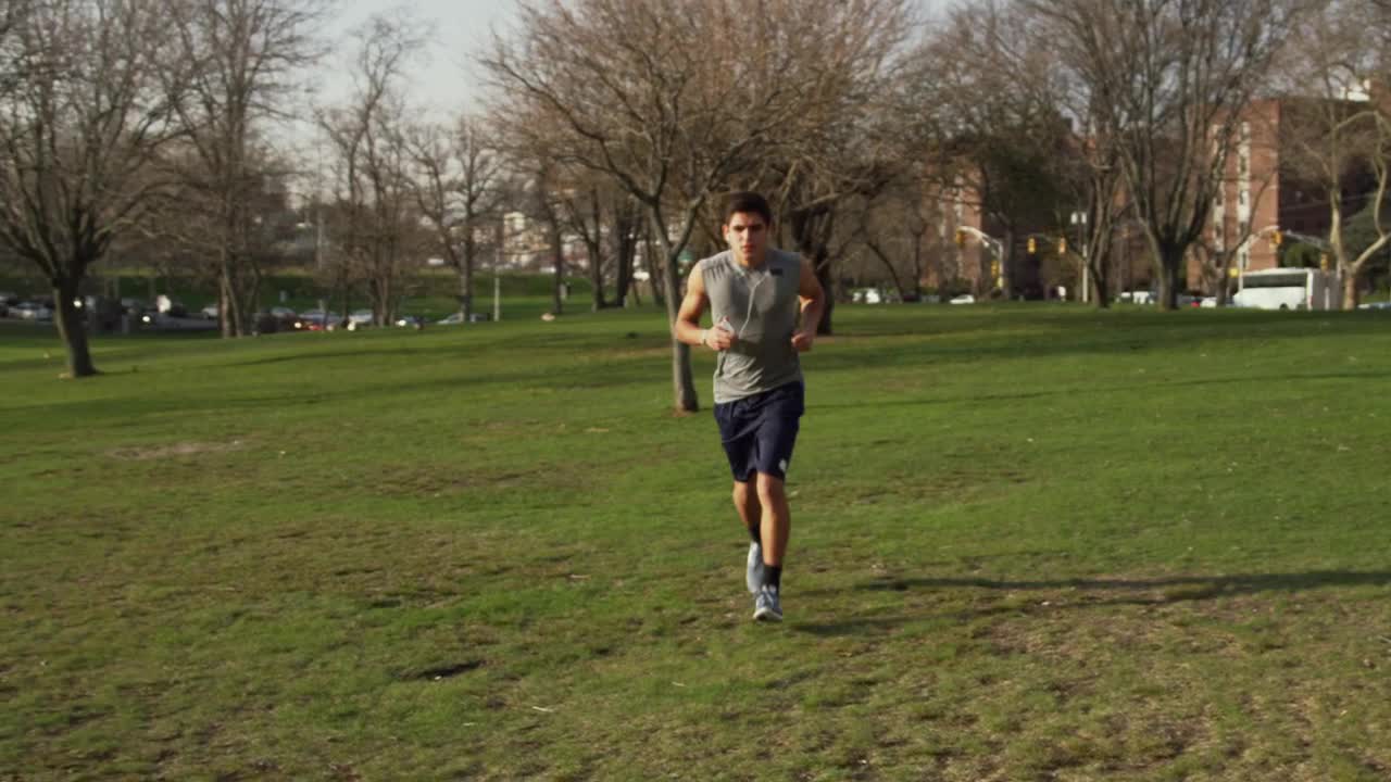 Download Stock Video Man Checking His Phone While Jogging Animated Wallpaper