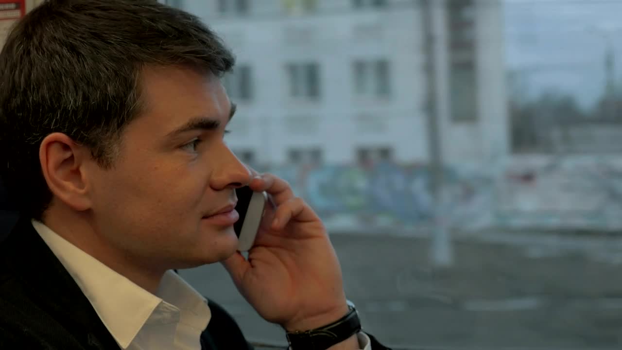 Download Stock Video Man Chatting To Colleagues On The Train Animated Wallpaper