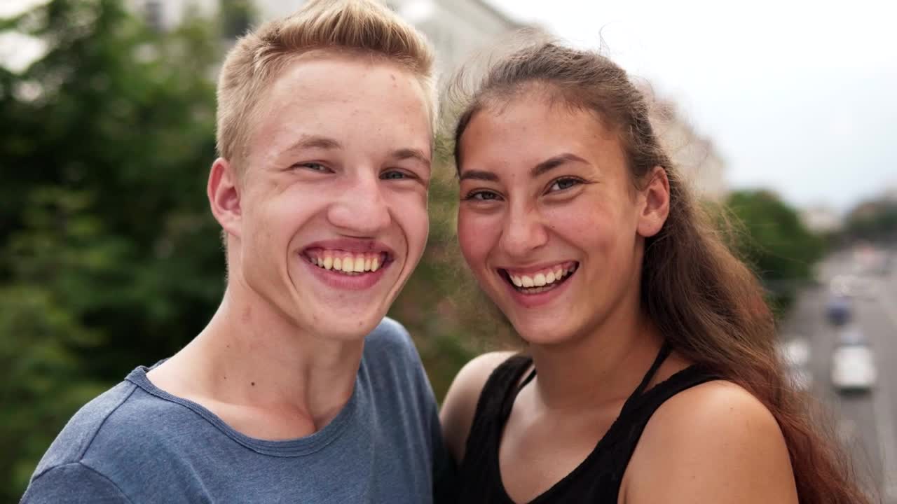 Download Stock Video Man And Woman Laughing Together Animated Wallpaper