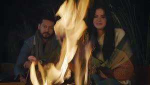 Stock Video Man And Woman Burning Marshmallows On A Campfire Animated Wallpaper