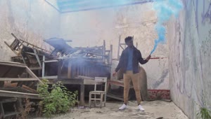 Stock Video Man And Smoke Bomb Animated Wallpaper