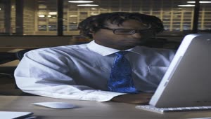 Stock Video Male Office Worker Working In An Lonely Office Animated Wallpaper