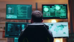Stock Video Male Hacker Sitting At His Desk Animated Wallpaper