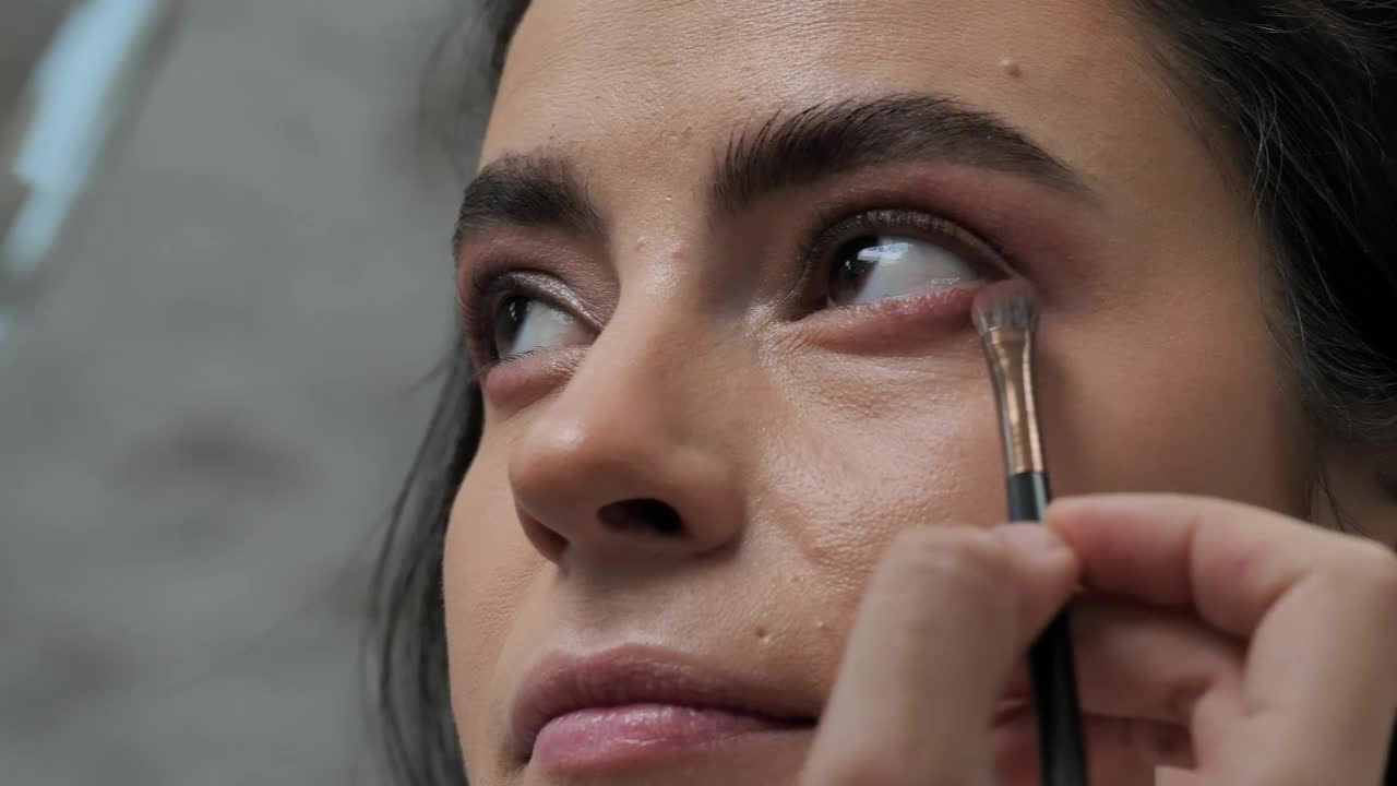 Download Stock Video Making Up A Womans Eyes 4058 Animated Wallpaper
