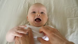Stock Video Making A Little Baby Laugh Animated Wallpaper