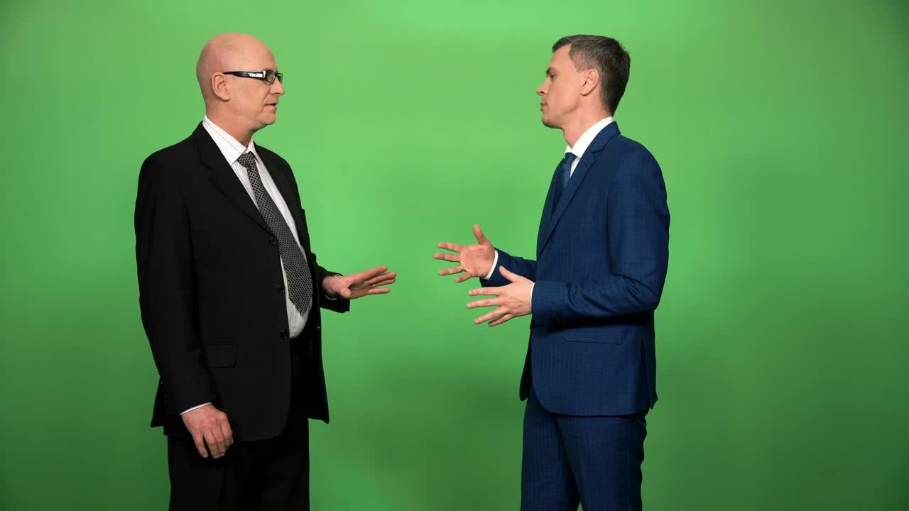 Download Stock Video Making A Business Deal With Green Screen Behind Animated Wallpaper