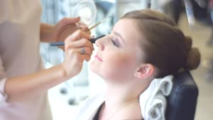 Stock Video Makeup Artist Working On Brides Face Animated Wallpaper