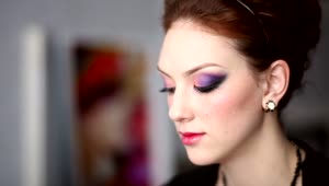 Stock Video Makeup Artist Doing Makeup On A Young Woman Animated Wallpaper