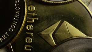 Stock Video Macro Shot Of Ethereum Golden Coins Animated Wallpaper