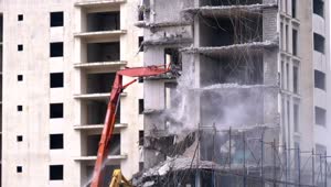 Stock Video Machine Cranes Destroying A Concrete Building Animated Wallpaper