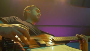 Stock Video Low View Of A Musician With His Electric Bass Animated Wallpaper